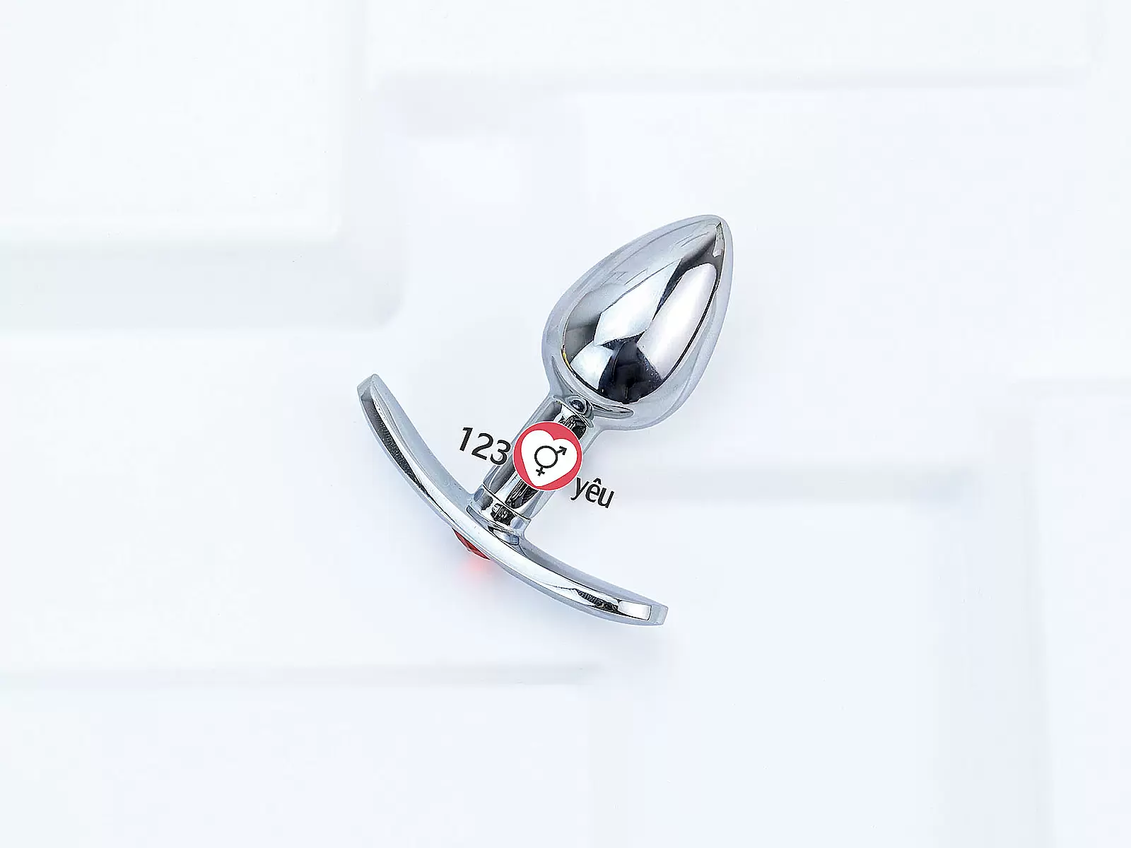 Dụng cụ kích thích hậu môn inox có tay cầm