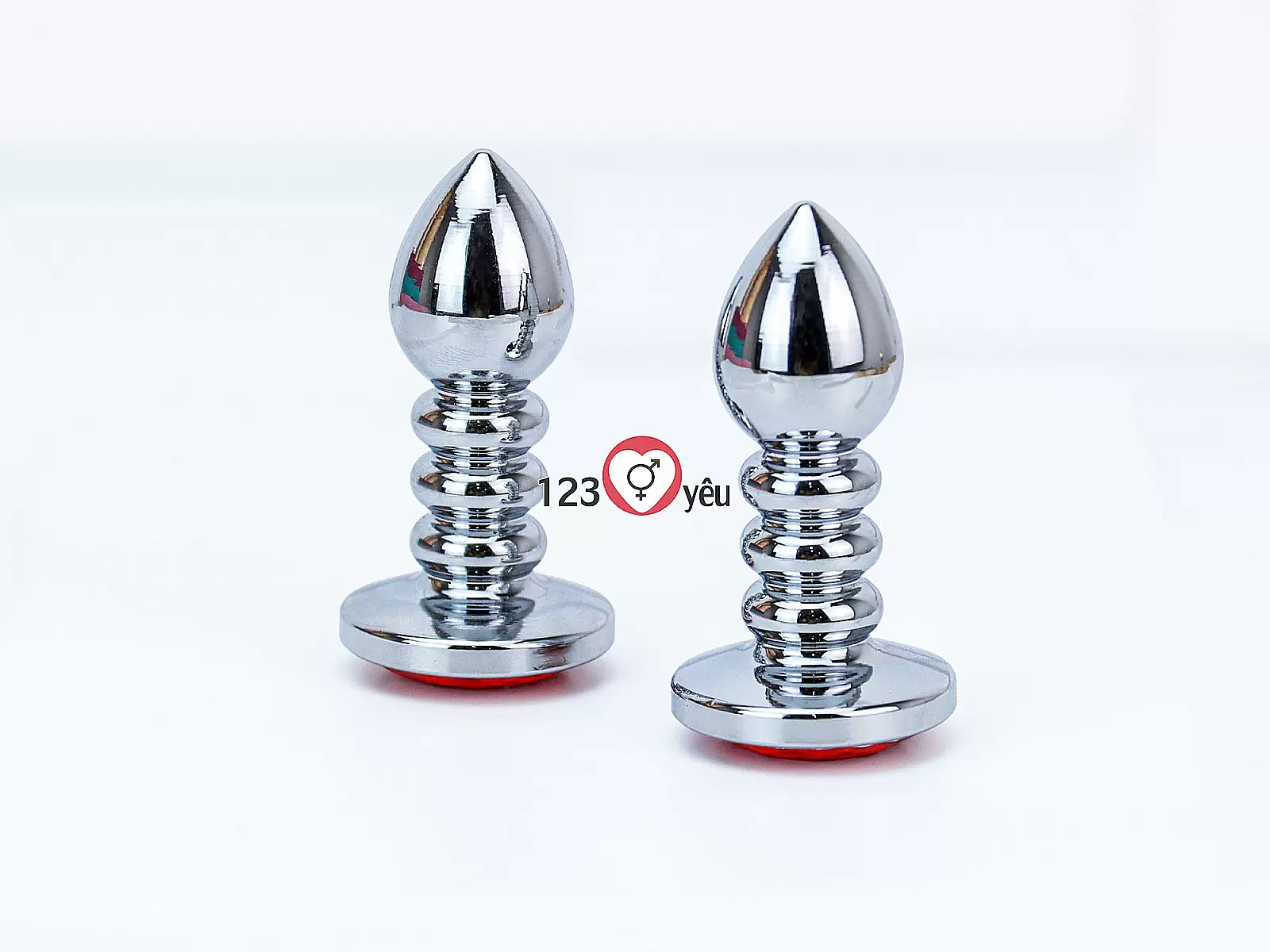 Đồ chơi kích hậu Inox xoắn ốc đuôi pha lê màu cam