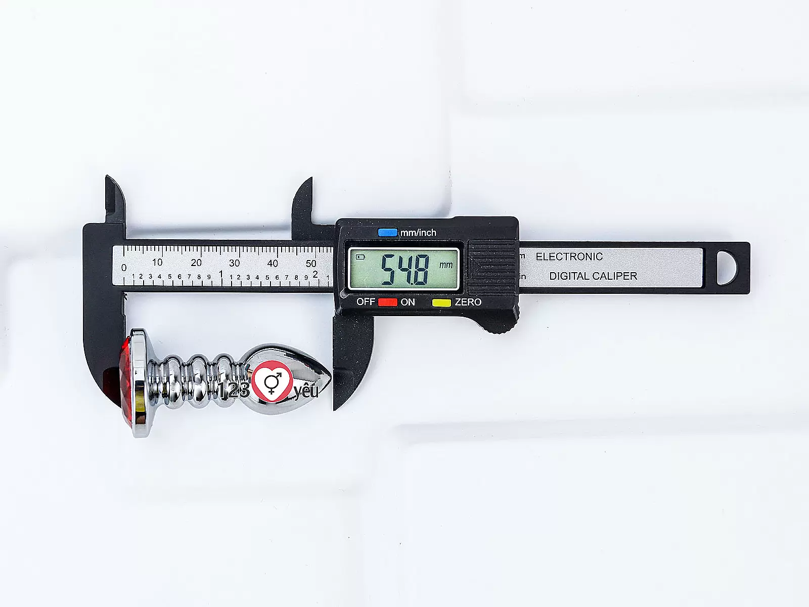 Đồ chơi kích hậu Inox xoắn ốc đuôi pha lê màu cam